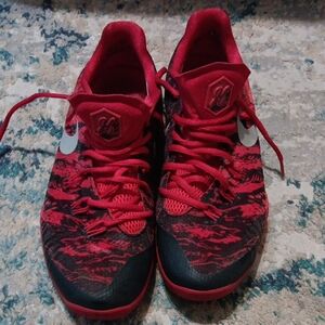 Red and Black Athletic Shoes